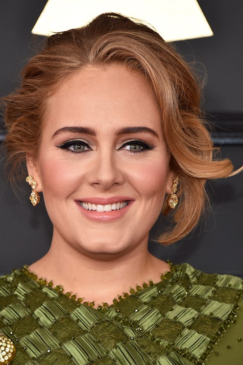 Adele in a green dress at the 59th Grammy Awards.