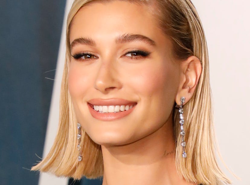 Hailey Bieber, who competed with Emma Chamberlain in a tiny hands competition.