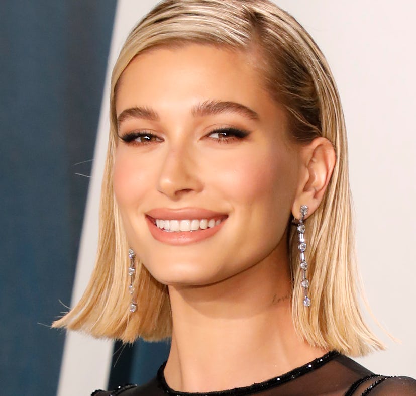 Hailey Bieber, who competed with Emma Chamberlain in a tiny hands competition.