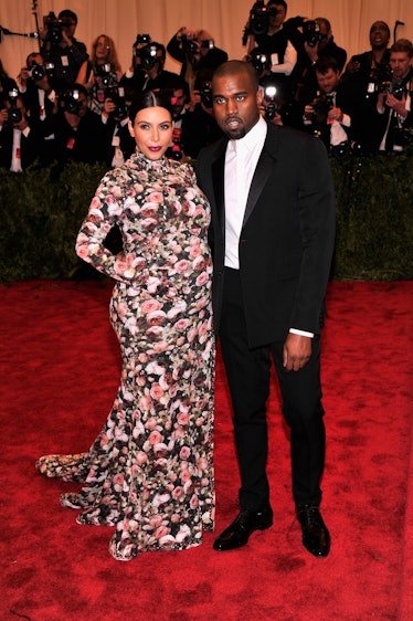 Kim Kardashian in a floral gown and Kanye West in a tuxedo at the Met Gala 