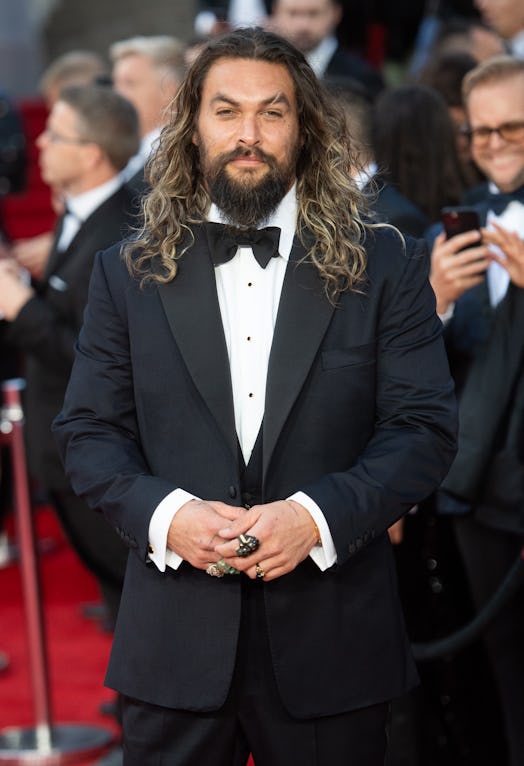 Jason Momoa in a black suit at the 'No Time To Die' London premiere. (Photo by Samir Hussein/WireIma...