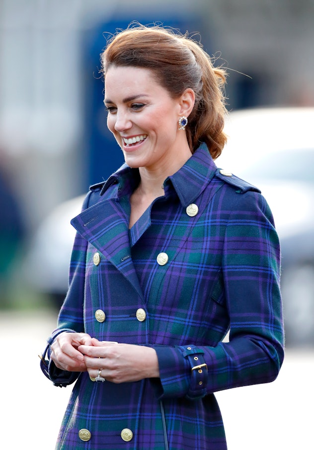 Kate Middleton does plaid in royal blue.