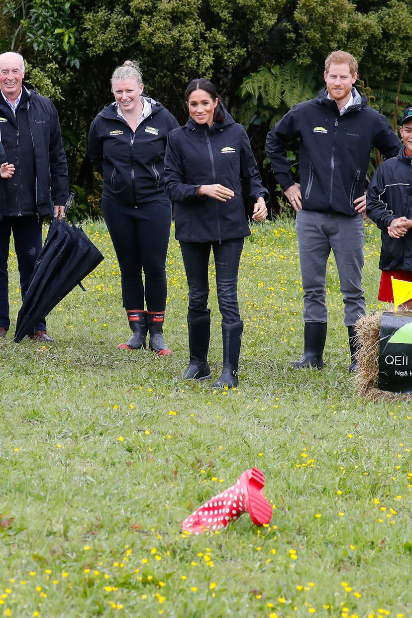 Meghan Markle wore rain boots.
