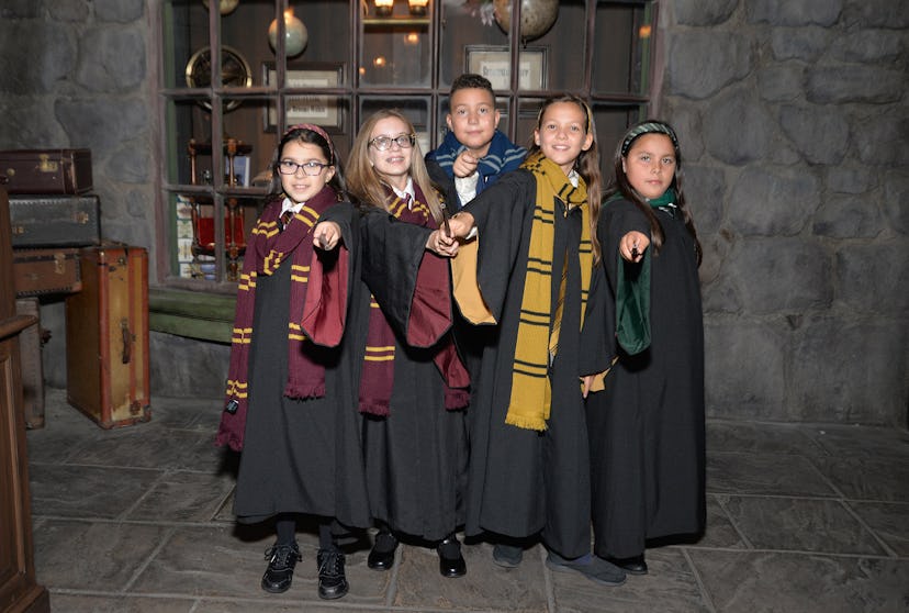 UNIVERSAL CITY, CA - NOVEMBER 16:  Children dressed in "Harry Potter" costumes pose at the opening o...