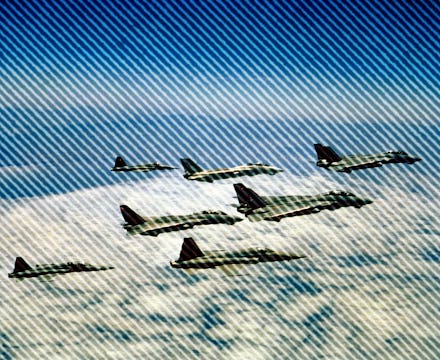 An air to air right side view of Fighter Squadron 51 (VF-51) and Fighter Squadron 111 (VF-111) F-14A...