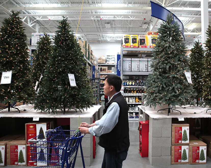 SAN FRANCISCO - NOVEMBER 04: A shopper at a Lowe's home improvement store walks by a display of art...