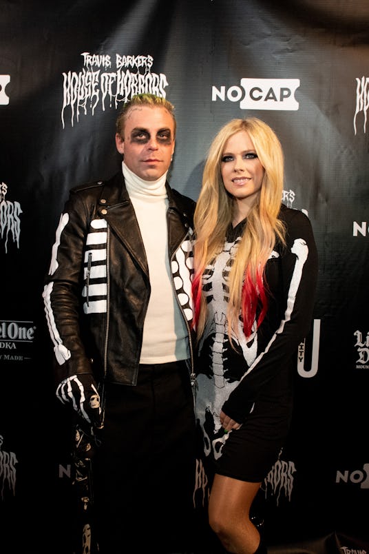 MALIBU, CALIFORNIA - OCTOBER 19: (L-R) Musicians Mod Sun and Avril Lavigne attend the NoCap x Travis...