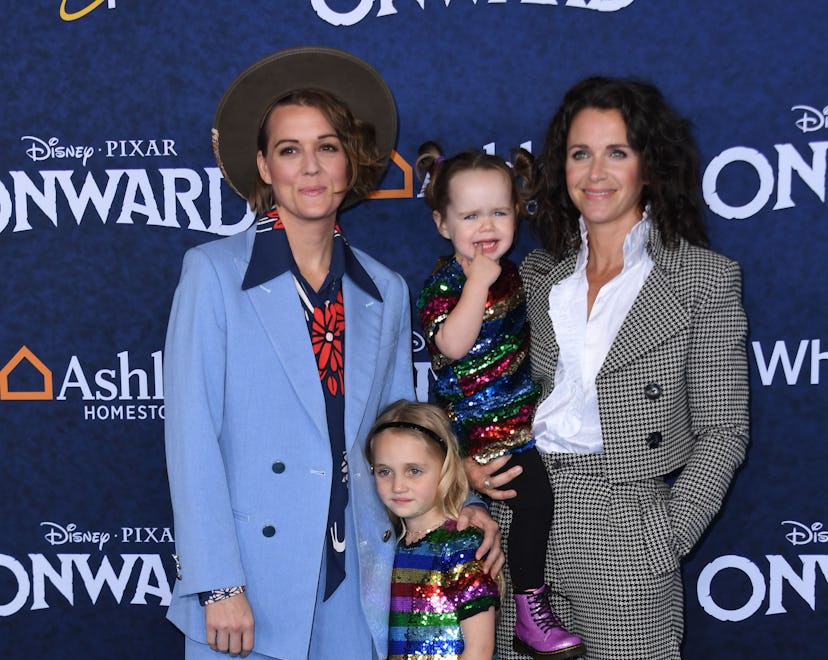 Singer-songwriter Brandi Carlile (L), her wife Catherine Shepherd and their daughters arrive for Dis...