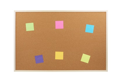 Cork board with colourful post it notes