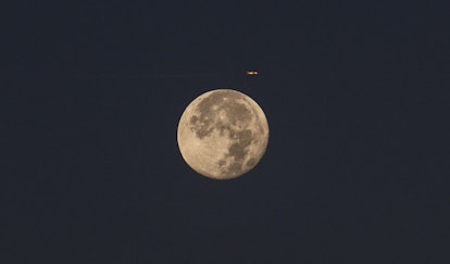 ANKARA, TURKEY - OCTOBER 22: Full Moon rises over the city, at early morning hours in Ankara, Turkey...