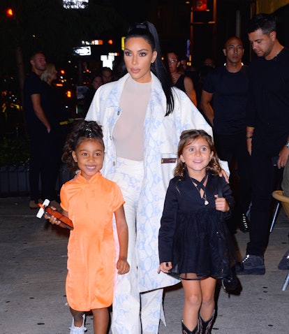 Kim Kardashian with North West and Penelope Disick, who have had adorable Halloween costumes in the ...