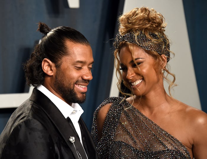 BEVERLY HILLS, CALIFORNIA - FEBRUARY 09: Russell Wilson (L) and Ciara attend the 2020 Vanity Fair Os...