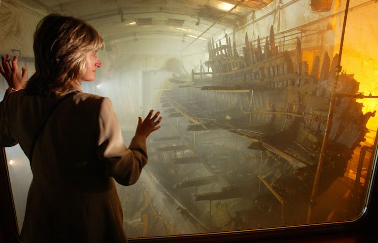 Jacquie Shaw of the Mary Rose Trust surveys the hulk of the famous Tudor warship as it sits in an at...