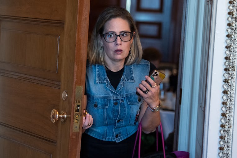 UNITED STATES - OCTOBER 26: Sen. Kyrsten Sinema, D-Ariz., leaves the Senate Democrats luncheon in th...