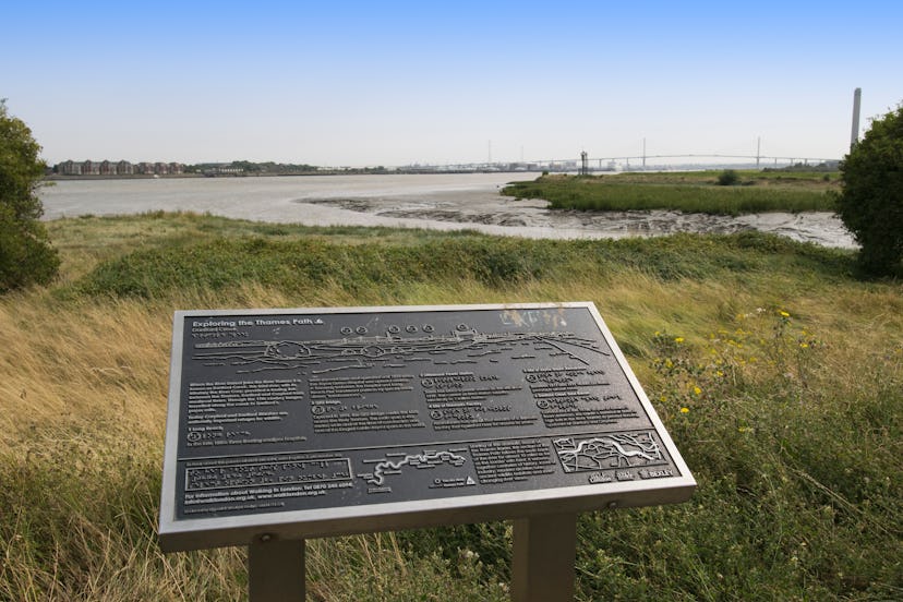 Signs on the route of the trail known as the London Loop. Overlooking the Queen Elizabeth 2 Bridge a...