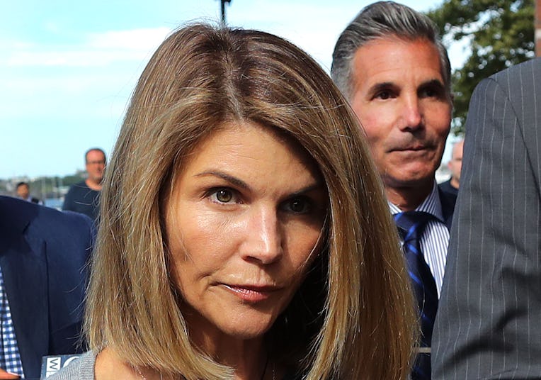 BOSTON, MA - AUGUST 27: Lori Loughlin and her husband Mossimo Giannulli, right, leave the John Josep...