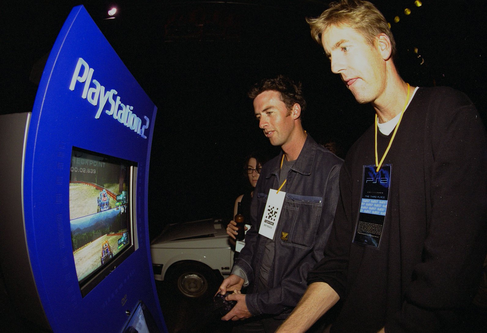 382603 08: Guests Nick Green and James Tompkins trial the new Sony Playstation 2 game console at the...
