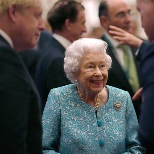 WINDSOR, UNITED KINGDOM - OCTOBER 19:  Britain's Queen Elizabeth II and Prime Minister, Boris Johnso...