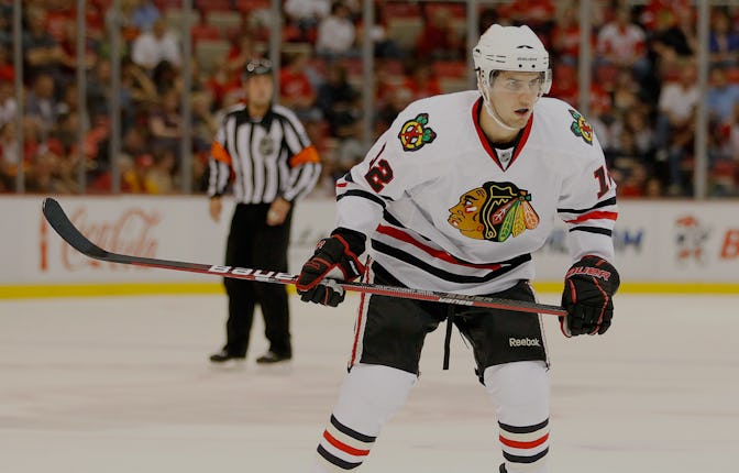 DETROIT - SEPTEMBER 24: Kyle Beach #12 of the Chicago Blackhawks skates against the Detroit Red Win...