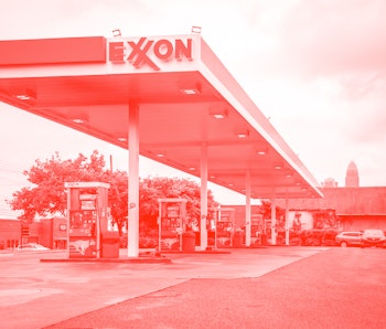 Gas pumps sit empty at an Exxon gas station in Charlotte, North Carolina on May 12, 2021. - Fears th...