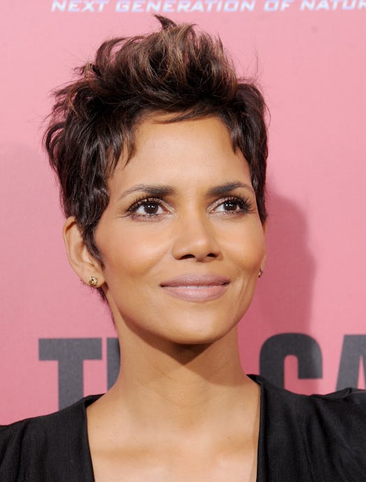 Halle Berry shown with her hair cut into a short pixie style, one of the top winter 2021 hair trends...