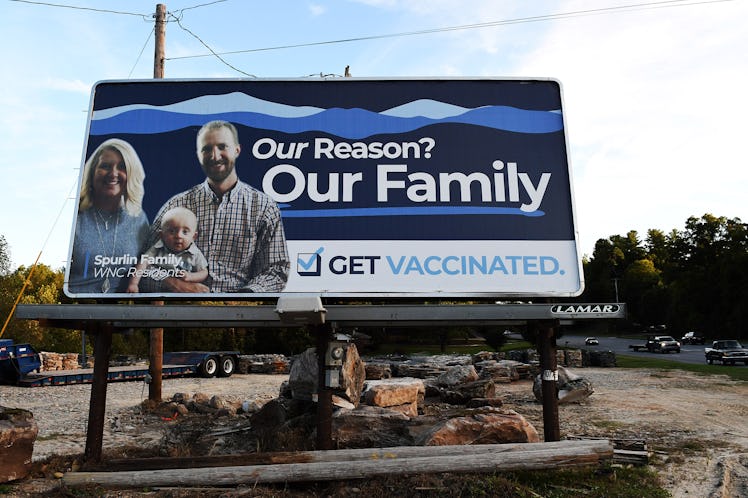 MARION, NORTH CAROLINA, UNITED STATES - 2021/10/20: A billboard encourages people to get vaccinated ...