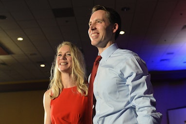 SPRINGFIELD, MO - NOVEMBER 06: Senator-Elect Josh Hawley, along with his wife, Erin Hawley, smile at...