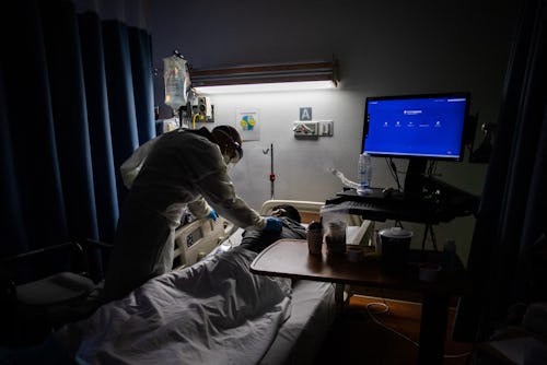 Doctor Delkhah Shahin checks on a 34 years old, unvaccinated, Covid-19 patient at Providence Cedars-...