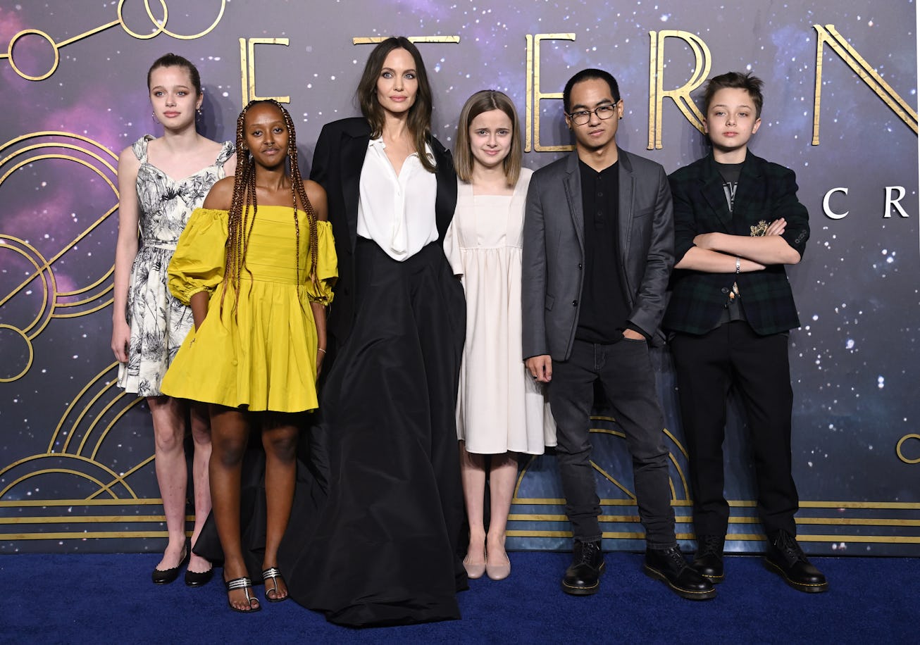 LONDON, ENGLAND - OCTOBER 27: (L-R) Shiloh Jolie-Pitt, Zahara Jolie-Pitt, Angelina Jolie, Vivienne J...