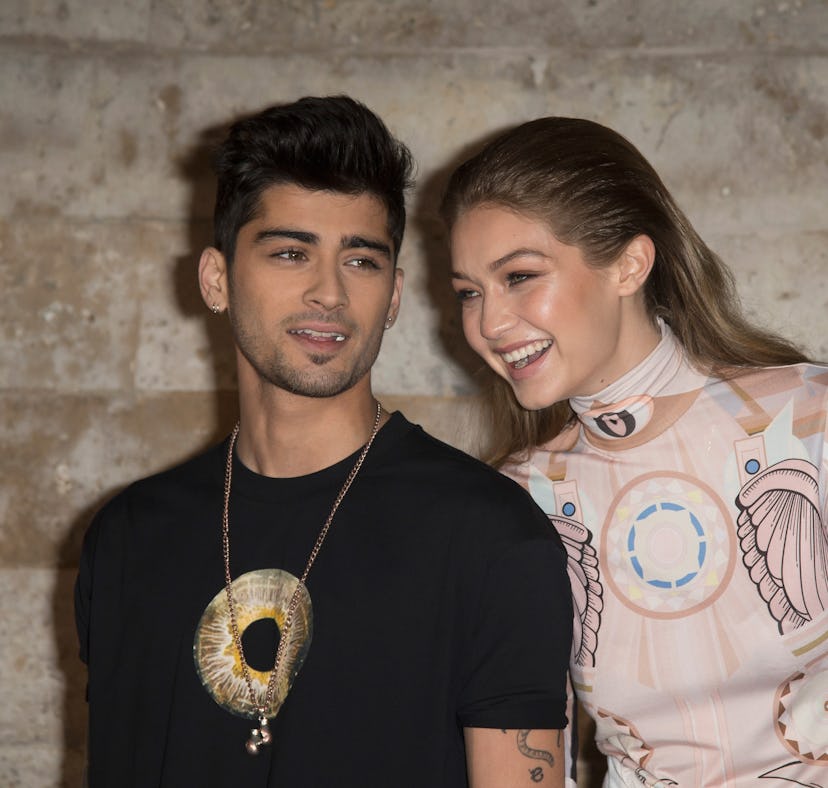 PARIS, FRANCE - OCTOBER 02: Zayn Malik and Gigi Hadid attend the Givenchy show as part of the Pari...
