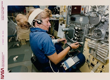 American NASA astronaut Jan Davis, mission specialist, talks to ground controllers as she works with...