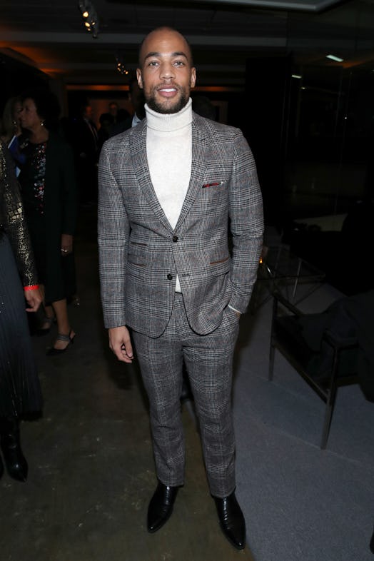 Kendrick Sampson poses in a gray plaid suit in Los Angeles, California. (Photo by Randy Shropshire/G...
