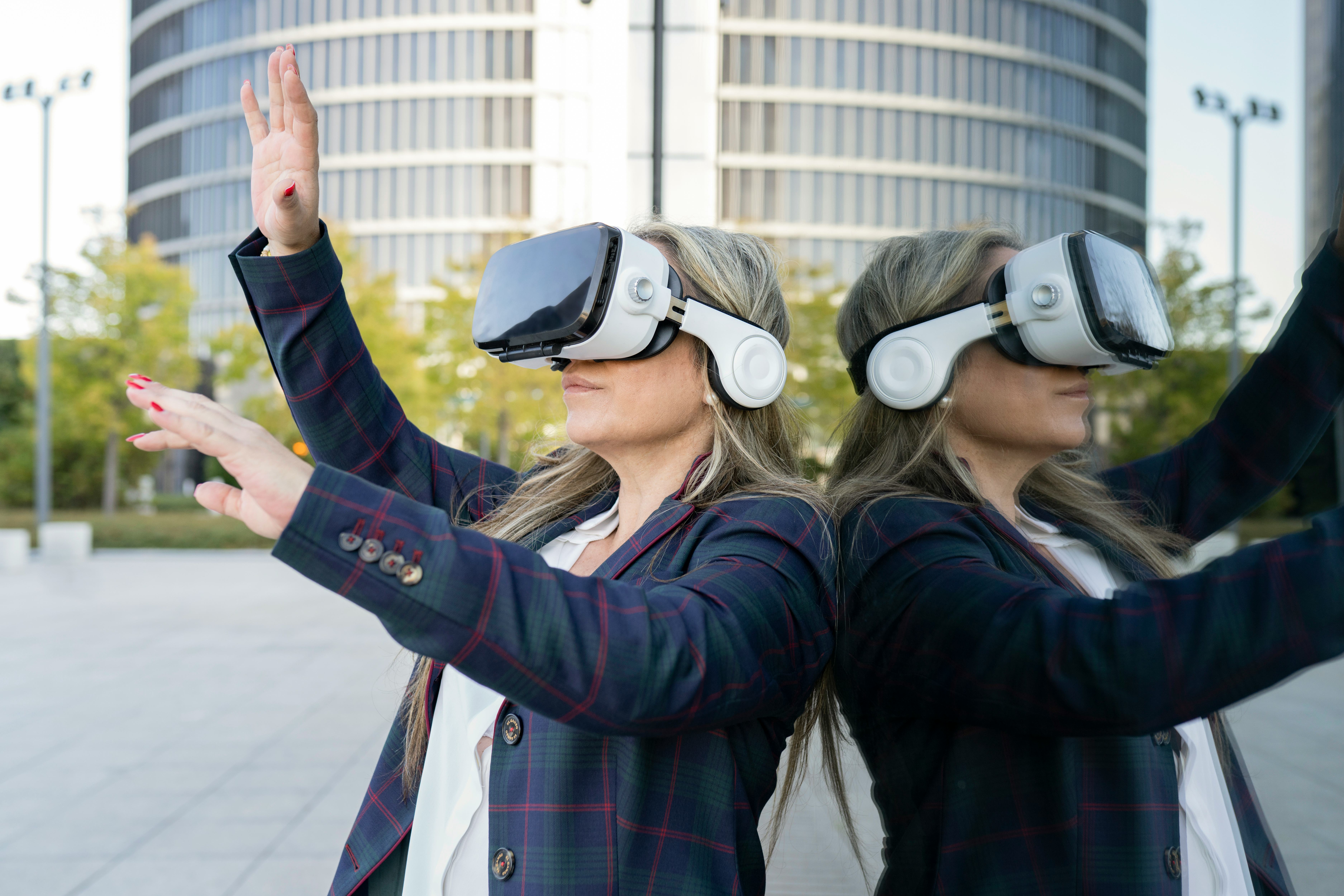 mature business woman wearing virtual reality glasses