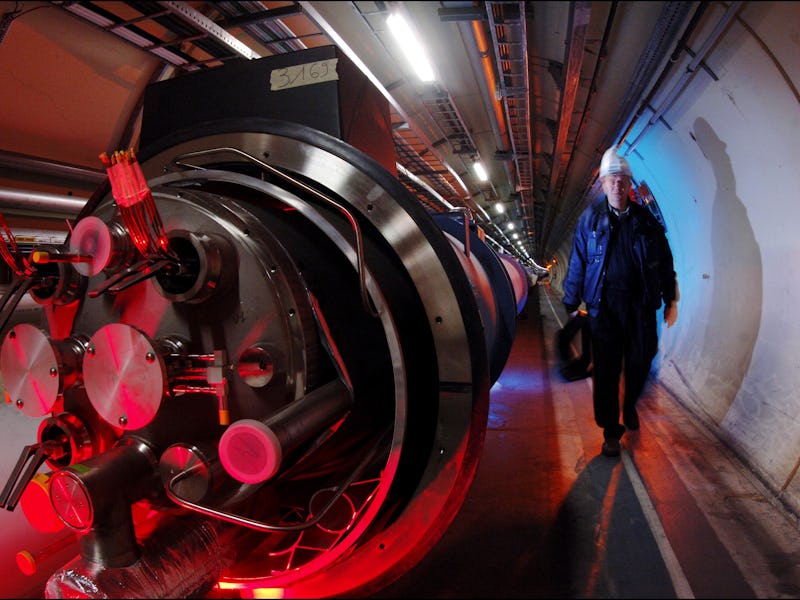Inside the 27-kilometer LHC tunnel, in the foreground, view of the interior of the dipole magnet (cr...