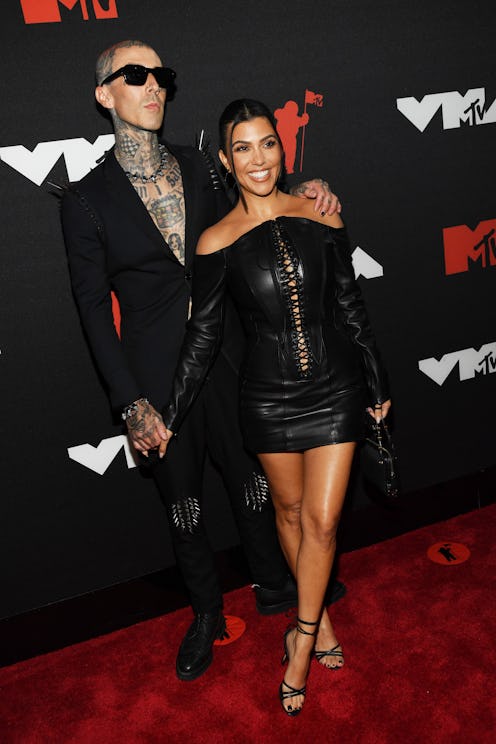 Travis Barker next to Kourtney Kardashian channeling Phoebe Bridgers at the 2021 MTV Video Music Awa...