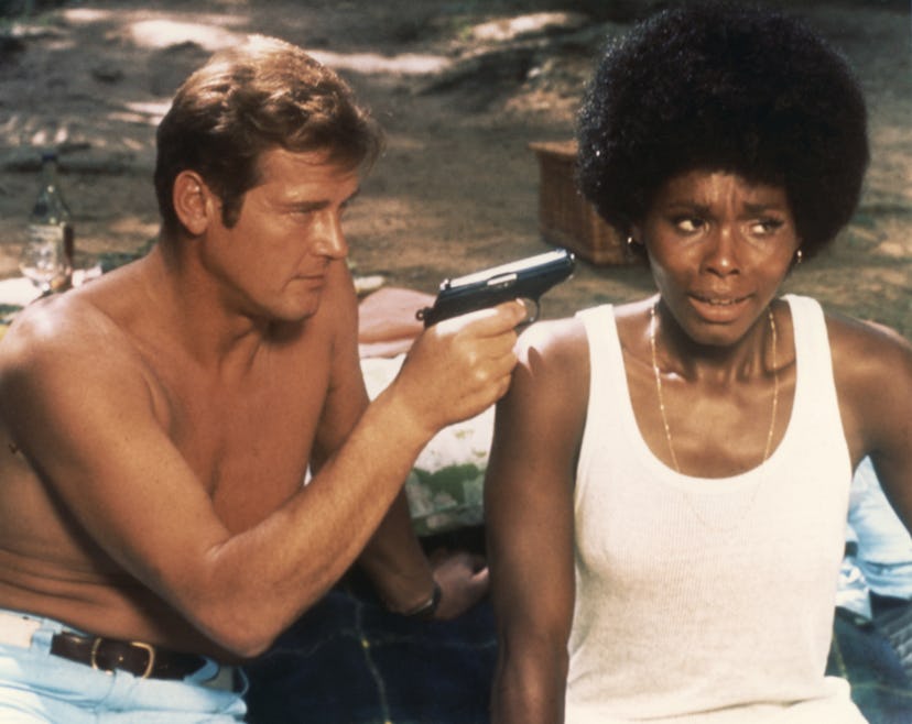 Actor Roger Moore and actress Gloria Hendry on the set of "Live And Let Die". (Photo by Sunset Boule...