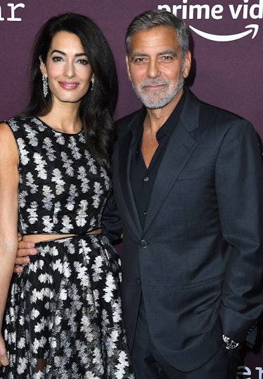 LOS ANGELES, CALIFORNIA - OCTOBER 03: George Clooney, Amal Clooney arrives at DGA Theater Complex on...