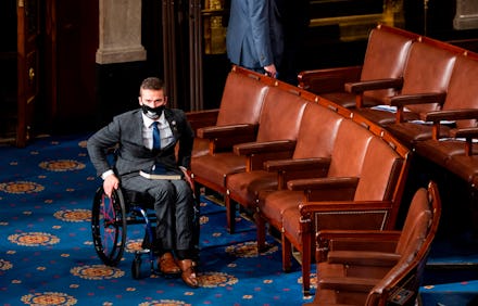 Rep. Madison Cawthorn, R-NC, arrives on the House floor in the Capitol in Washington, DC, before bei...