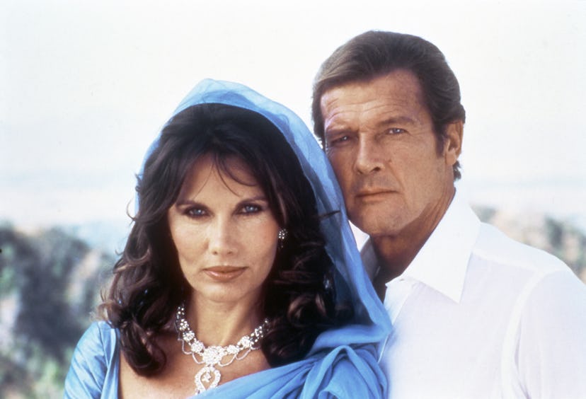 Actor Roger Moore and actress Maud Adams on the set of "Octopussy". (Photo by Sunset Boulevard/Corbi...