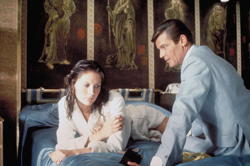 Actor Roger Moore and actress Maud Adams on the set of “The Man With The Golden Gun”. (Photo by Suns…