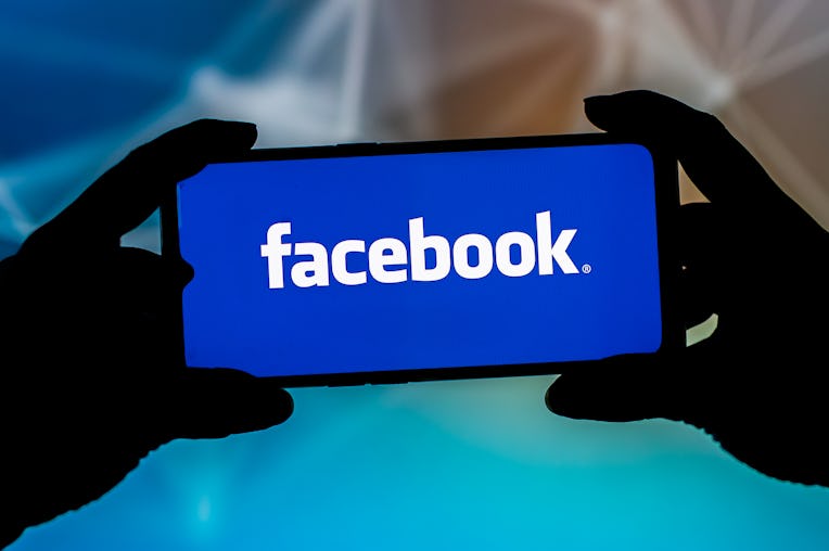 POLAND - 2021/09/23: In this photo illustration a Facebook logo seen displayed on a smartphone. (Pho...