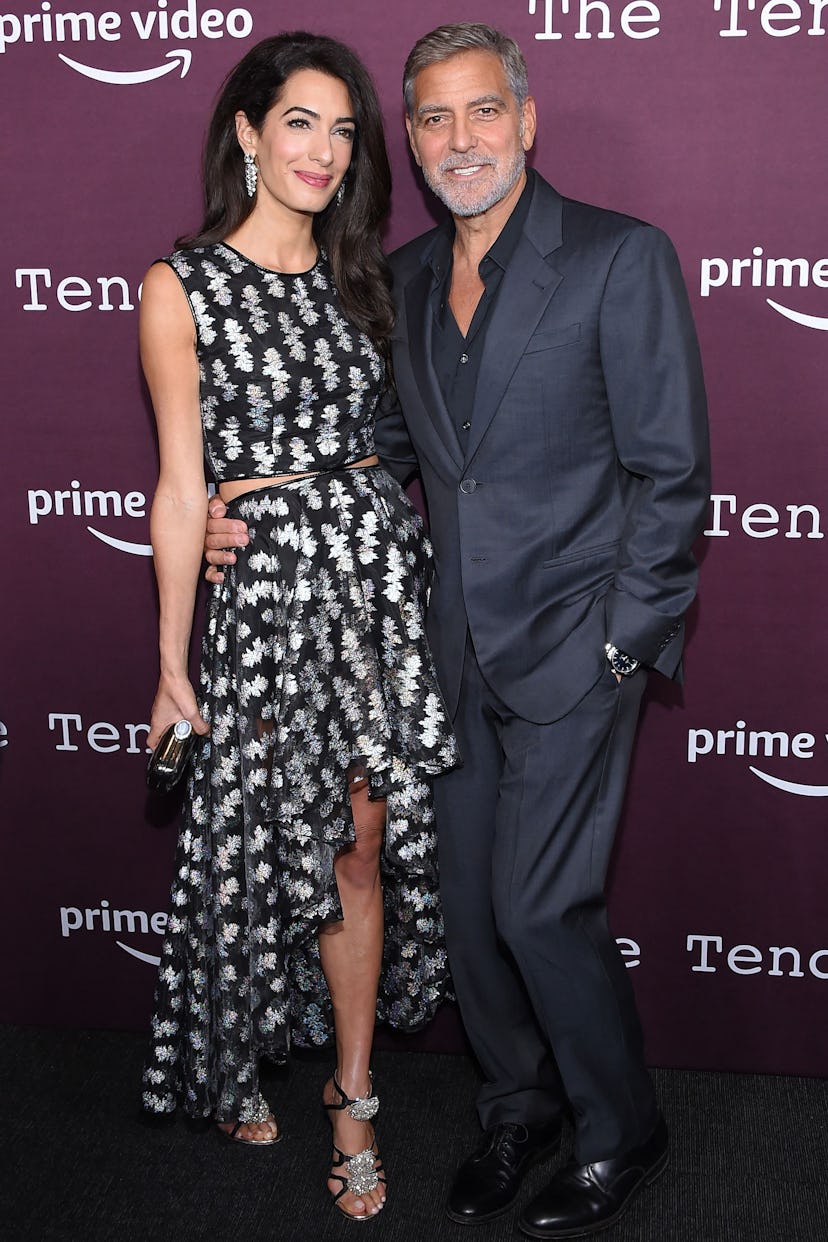 Lebanese-British barrister Amal Clooney (L) and husband US actor George Clooney arrive for "The Tend...