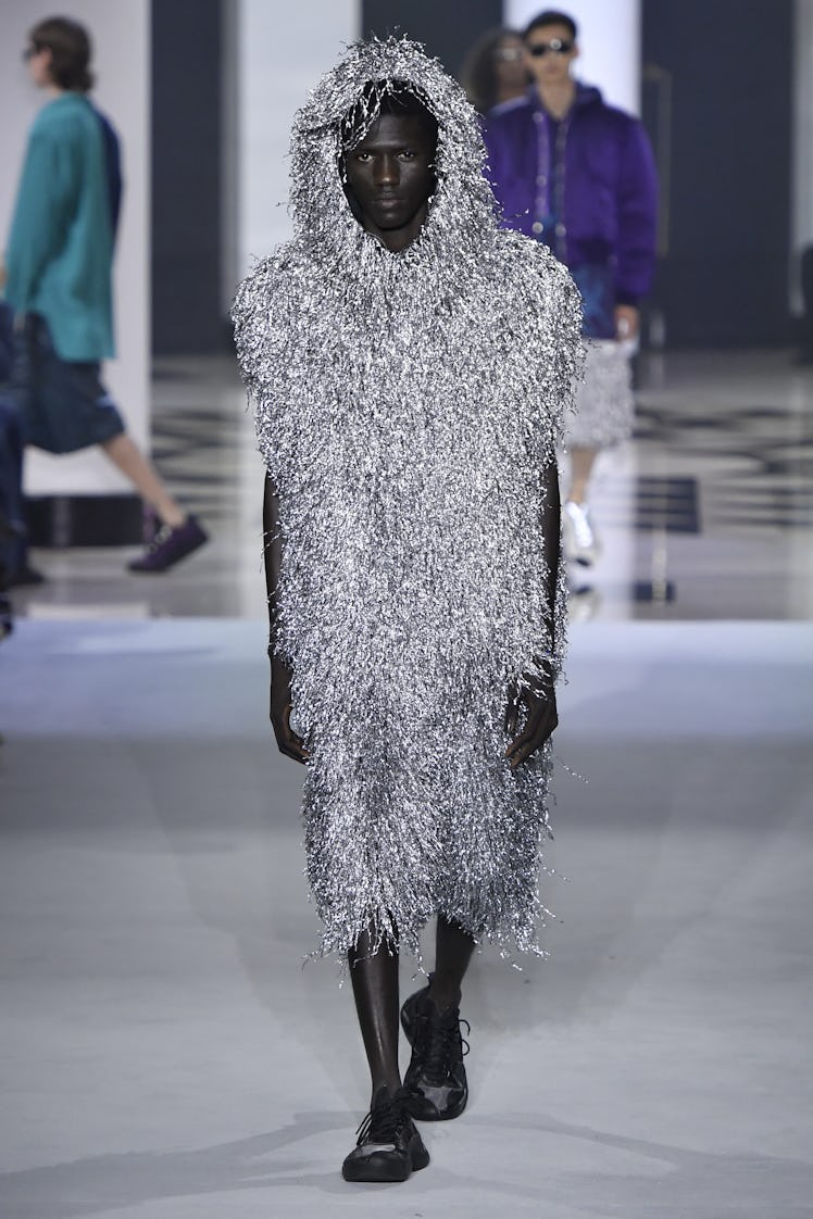 A model walking in a silver sequin outfit at the Lanvin Ready to Wear Spring/Summer 2022 show