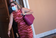 WASHINGTON, DC - SEPTEMBER 30: Sen. Kyrsten Sinema (D-AZ) leaves a Democratic luncheon before headin...