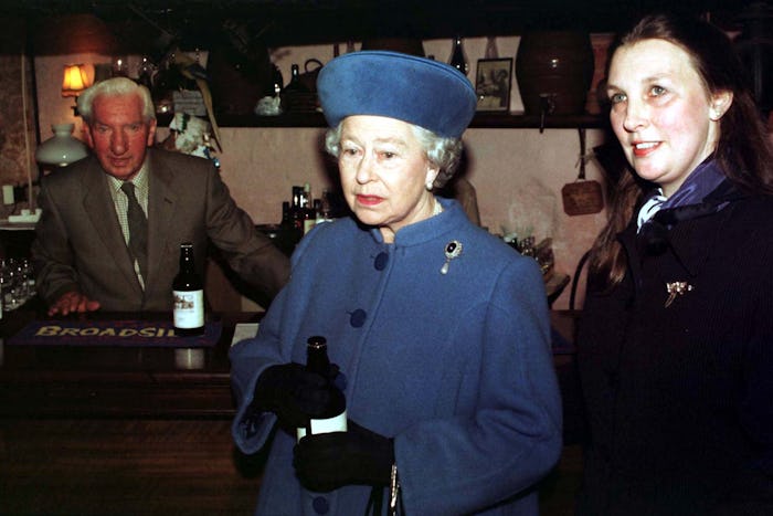 HM The Queen with landlady Caroline Cheffers-Heard during her first-ever official visit to a pub at ...