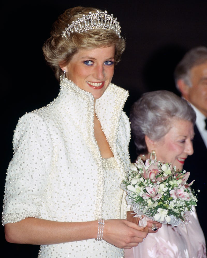 Princess Diana wears her three-stranded pearl bracelet. 