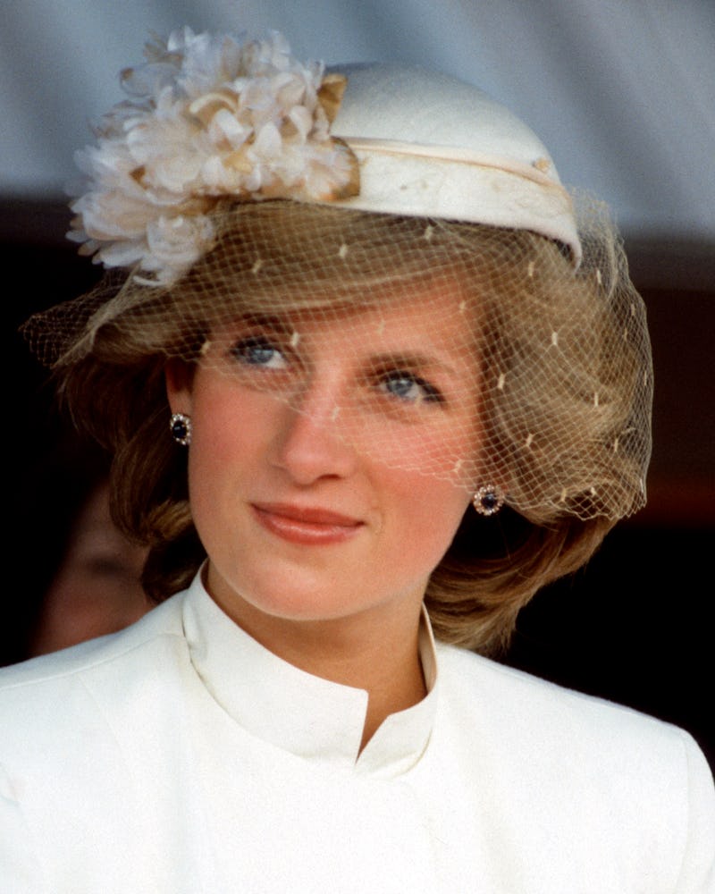 Princess Diana wears her sapphire earrings at a welcome ceremony in Tauranga, New Zealand in April 1...
