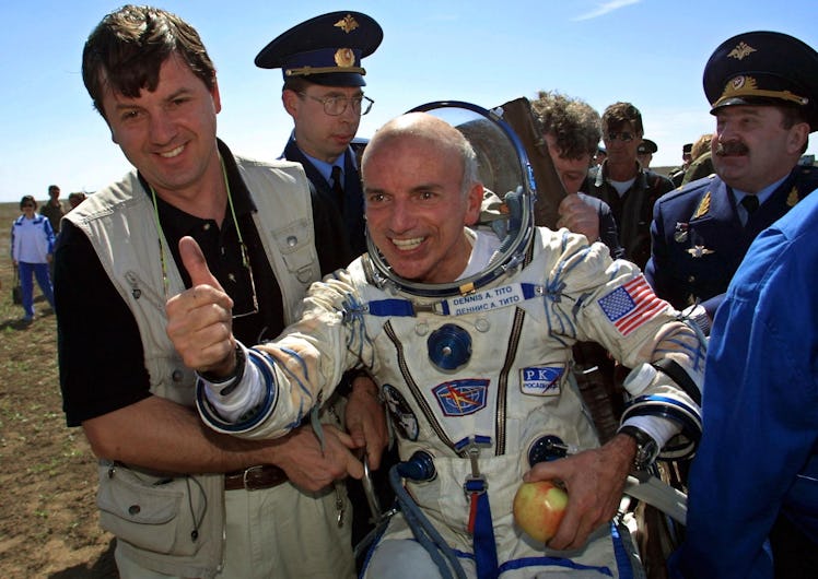 US space tourist Dennis Tito celebrates after his landing near the Kazakh town of Arkalyk (some 300 ...