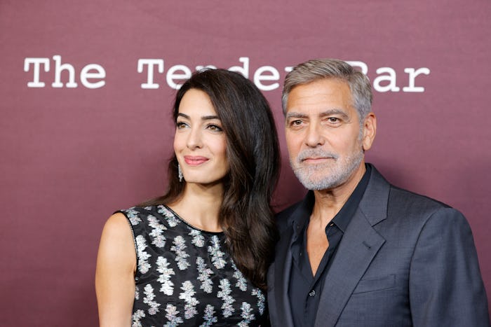LOS ANGELES, CALIFORNIA - OCTOBER 03: Amal Clooney (L) and George Clooney (R) attend the Los Angeles...