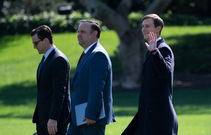 (L-R) Assistant to the President and Director of Oval Office Operations Nicholas Luna, Assistant to ...
